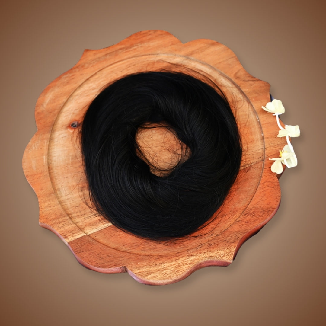 Jet black doughnut bun made from 100% human hair for sleek look