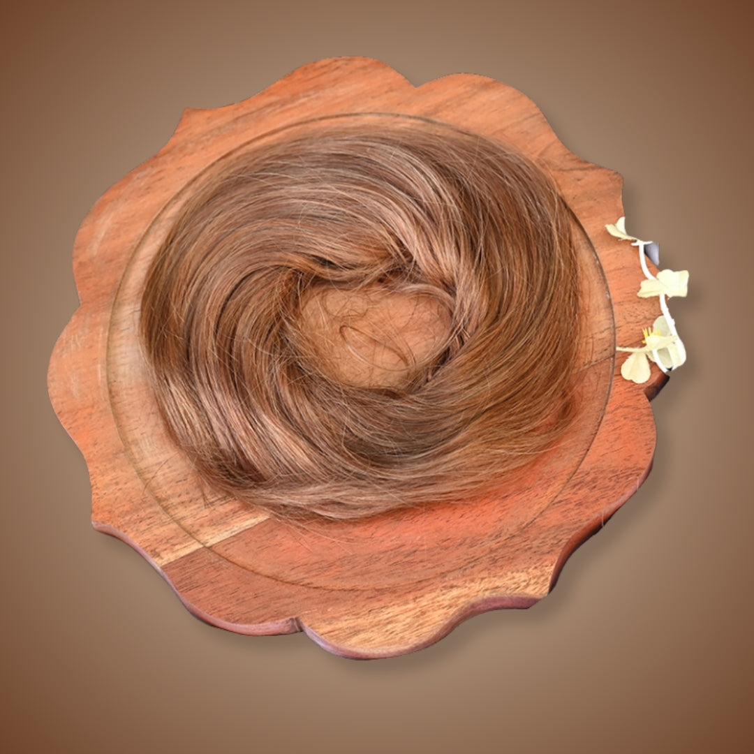 Light brown doughnut bun made from 100% human hair