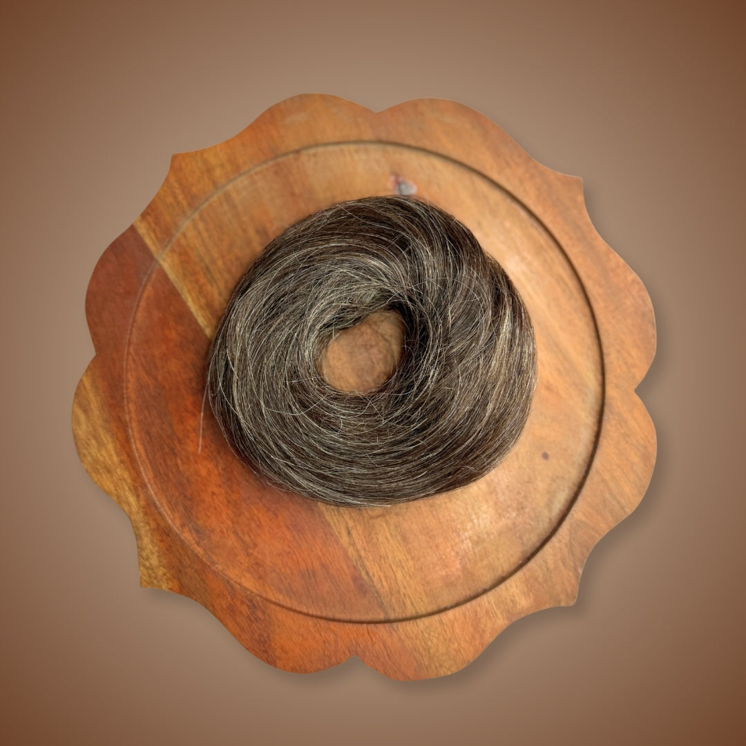 Salt and pepper doughnut bun made from 100% human hair